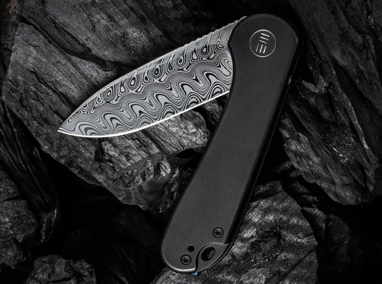 Elementum Damascus Titanium Black|WE Knife Outlet