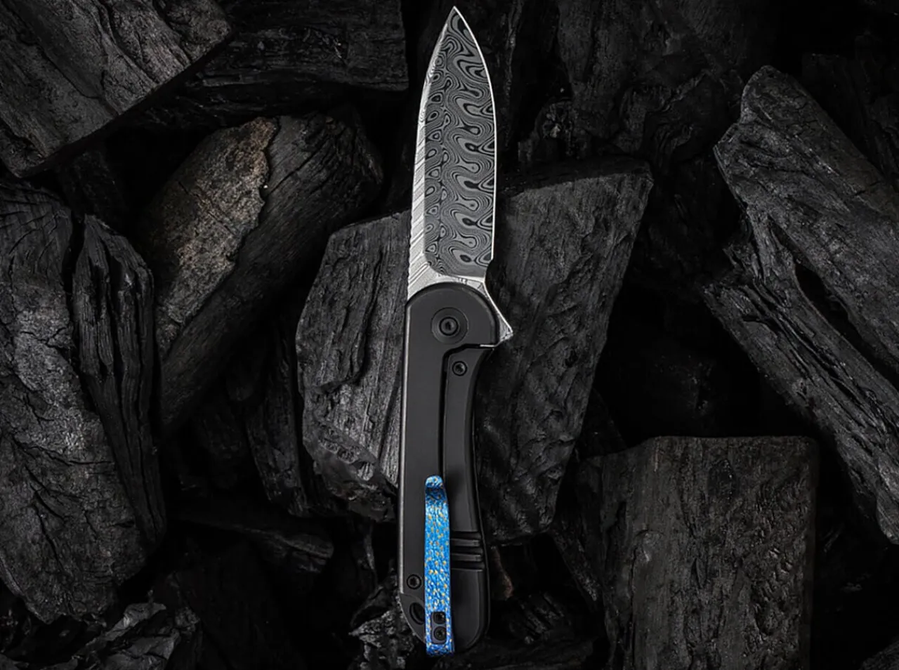 Elementum Damascus Titanium Black|WE Knife Outlet